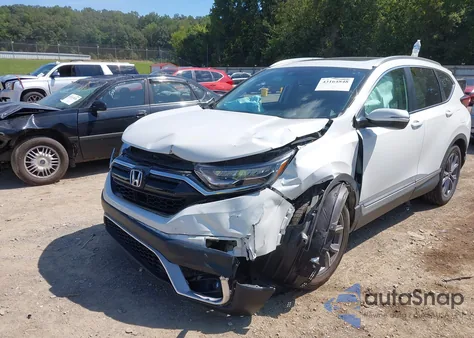 2020 Honda Cr-V 2Wd Touring from USA, damaged, VIN 2HKRW1H97LH409358